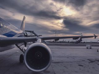European airline operations scene, representing AON and cut-e style pilot assessments